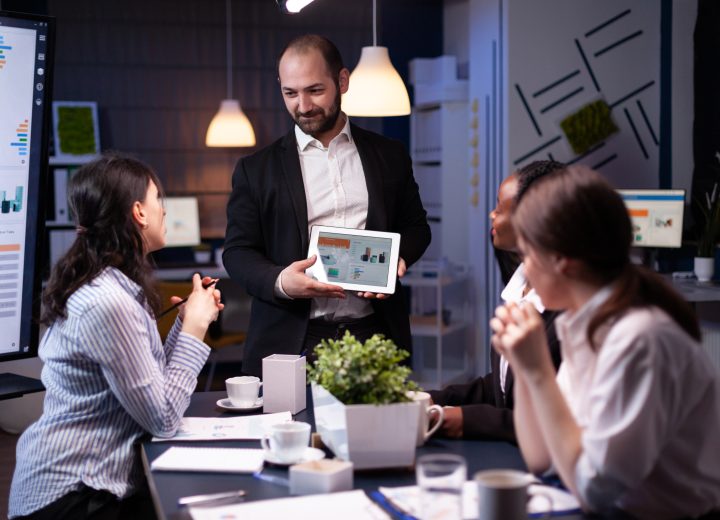 entrepreneur businessman showing company strategy using tablet corporate presentation