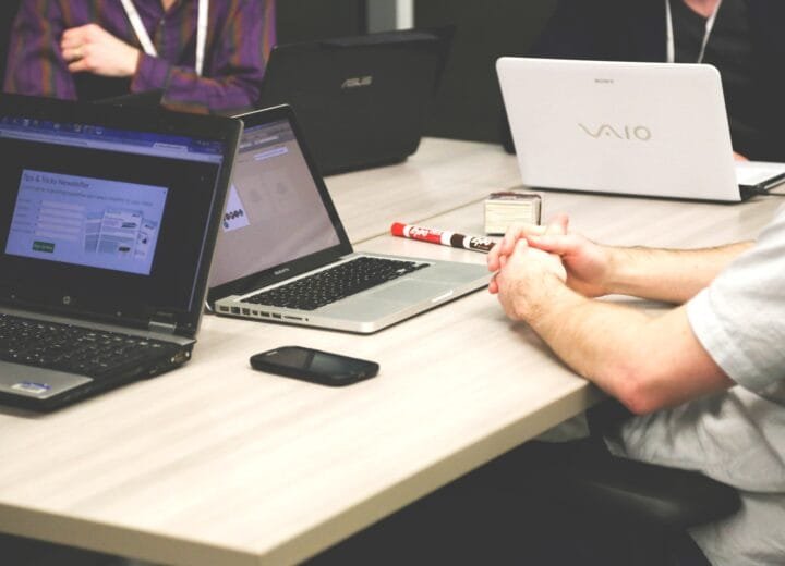 Laptops, meeting, businessmen